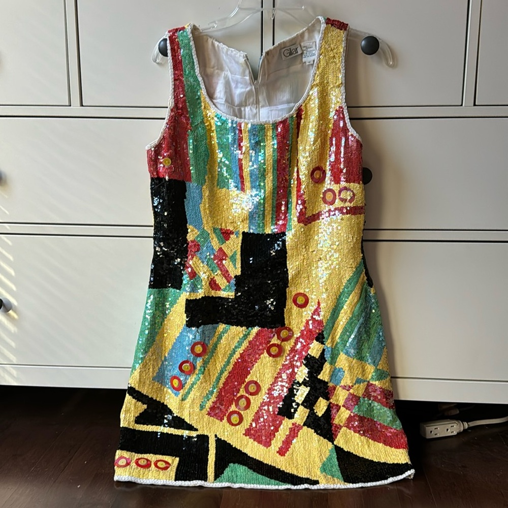 Gorgeous sequins colorful dress. Great for celebrating a special occasion.